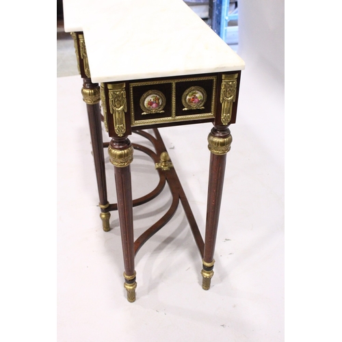 66 - A GOOD PAIR OF LOUIS XVI STYLE BREAKFRONT CONSOLE TABLES with white marble tops, fitted with a centr... 