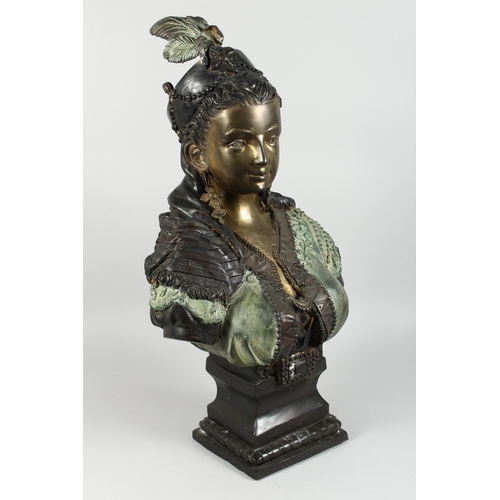 72 - A GILDED BRONZE BUST OF AN ARAB LADY with plumed head dress and bead decoration, 2 ft. 5 in. high.