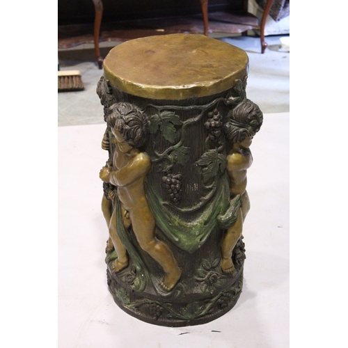 76 - A GOOD TWO COLOUR BRONZE CIRCULAR STAND with Bacchanalian cherubs, square marble top, 2 ft. 6 in. hi... 