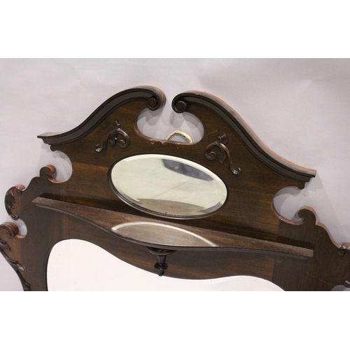 79 - A MAHOGANY SWAN NECK TOPPED MIRROR with small oval panel and kidney shaped mirror panel, 3 ft. 1 in.... 