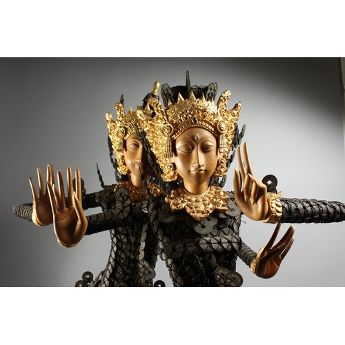 89 - A THAI GROUP OF TWO DANCING FIGURES MODELLED FROM HUNDREDS OF COINS, 3 ft. 6 in. high