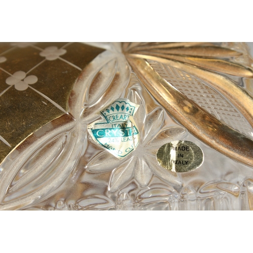 9 - A CUT GLASS AND GILDED CASKET with domed top on clawed feet, 7 in. wide.