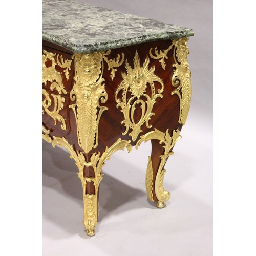 91 - AN ENORMOUS LOUIS XVITH STYLE MARBLE TOPPED COMMODE with shaped grey marble top.  The front smothere... 