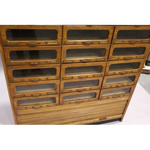 94 - A GOOD HABERDASHERY CABINET with ten rows of three drawers with metal handles, tambour to the base, ... 