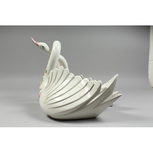 104 - A CONTINENTAL POTTERY ENTWINED SWAN BOWL, 11ins high.