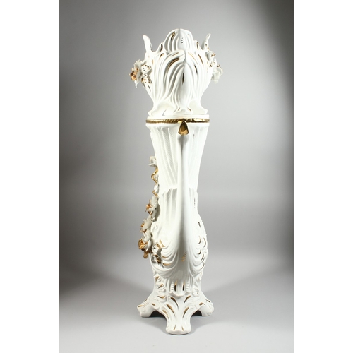 107 - A LARGE POTTERY WHITE GILDED JARDINIERE AND STAND with gilt flowers, 3 ft 8 ins high.