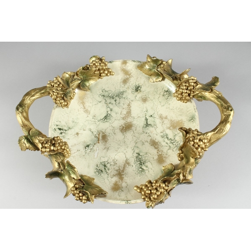 112 - A ITALIAN POTTERY AND GLASS FRUITING VINE DISH, 15 ins diameter.