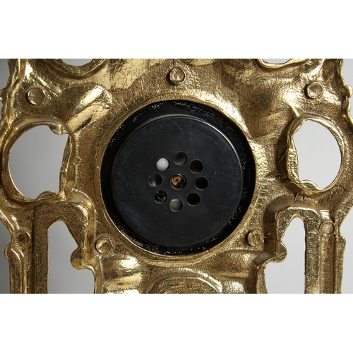 117 - A FOUR DIAL CLOCK BAROMETER in a gilded  frame, 31.5 ins long