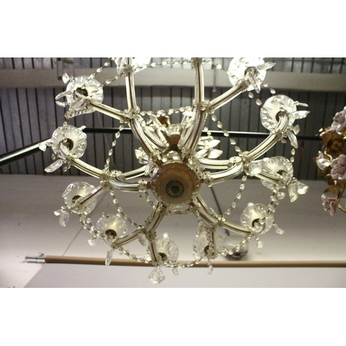 128 - A GOOD ITALIAN GLASS TWELVE LIGHT CHANDELIER with prism drops 2 ft. 4 ins wide, 2 ft high.