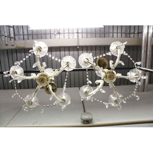 132 - A SMALL PAIR OF ITALIAN GLASS FIVE LIGHT CHANDELIERS with prism drops. 1 ft. 6 ins. wide, 1ft high.... 