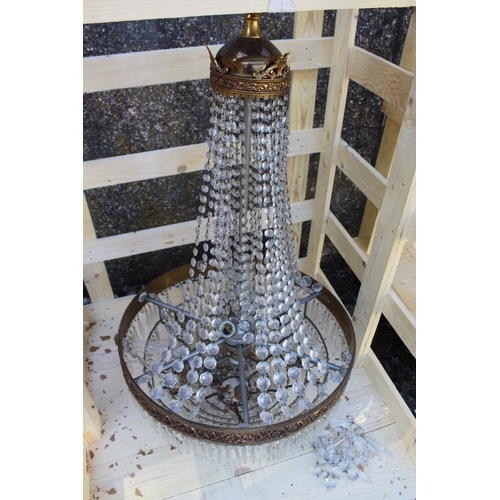 134 - A LARGE ORMULU AND CUT GLASS BAG STYLE CHANDELIER 3 ft 6 ins high x 2 ft wide