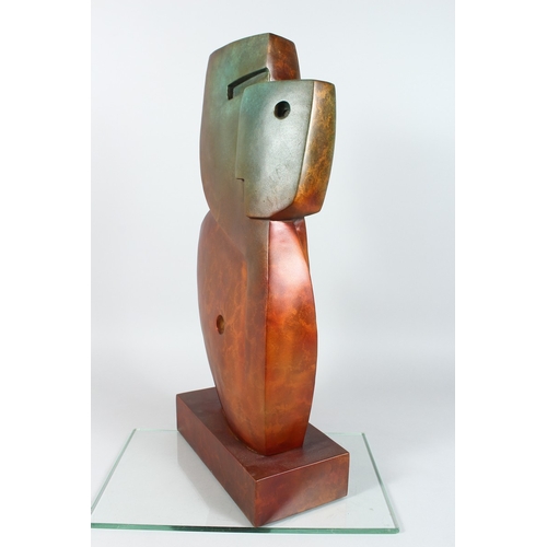 138 - A GOOD ABSTRACT BRONZE MALE FIGURE on a rectangular base. 24 ins high.