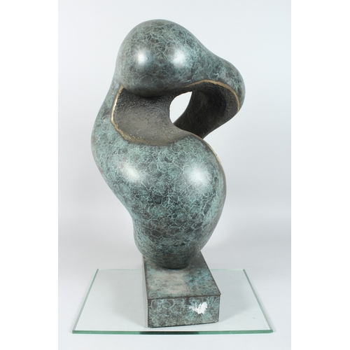 140 - A LARGE ABSTRACT SPECKLED BRONZE ENTWINED FIGURE on a rectangular  base, 20ins. high.