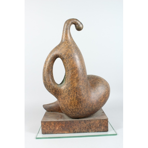 141 - A LARGE ABSTRACT SPECKLED BRONZE FIGURE on a rectangular shell. 20 ins high.