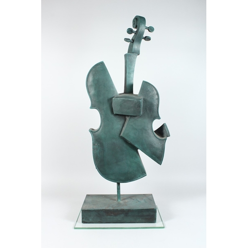 143 - AN ABSTRACT BRONZE CELLO on an rectangular base 34 ins high.