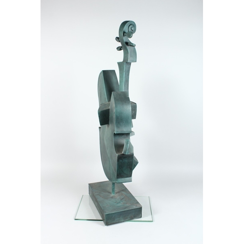 143 - AN ABSTRACT BRONZE CELLO on an rectangular base 34 ins high.