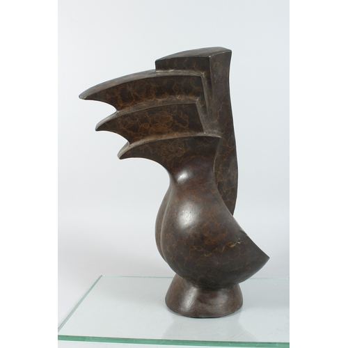 145 - A BRONZE ABSTRACT SCULPTURE 17 ins high.