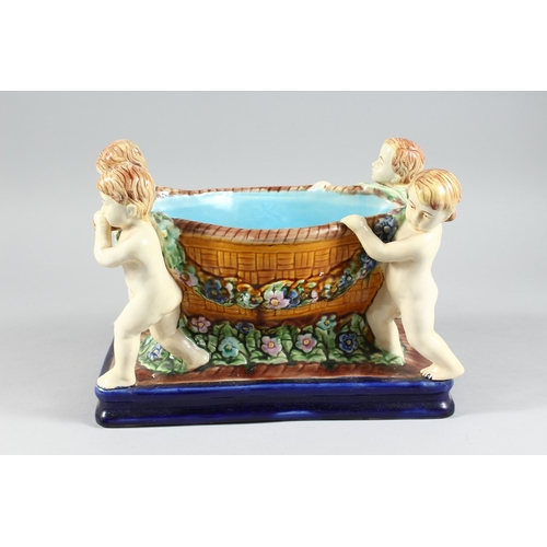 147 - A MAJOLICA MINTON DESIGN POTTERY PLATTER with four cupids