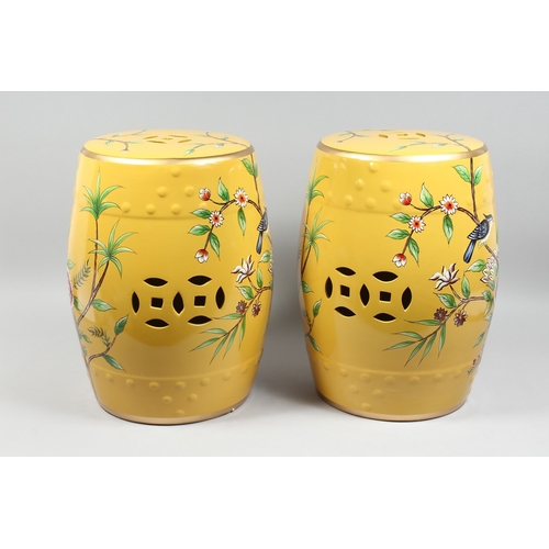 153 - A PAIR OF CHINESE YELLOW BARREL SEATS with birch and flowers 17 ins high