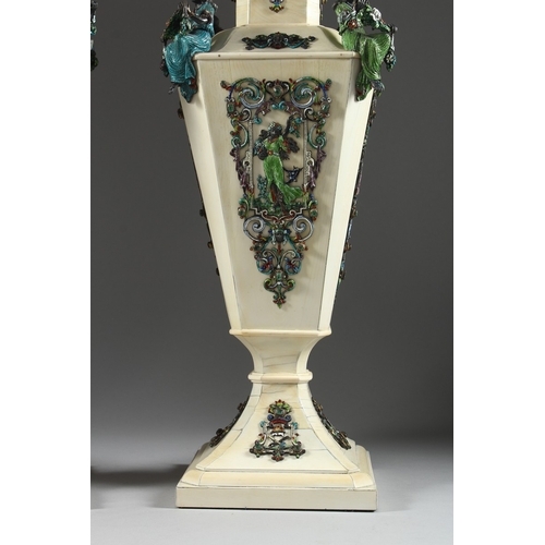 157 - A SUPERB PAIR OF VIENNA IVORY TAPERING VASES AND COVERS, mounted silver and enamel plaques set with ... 