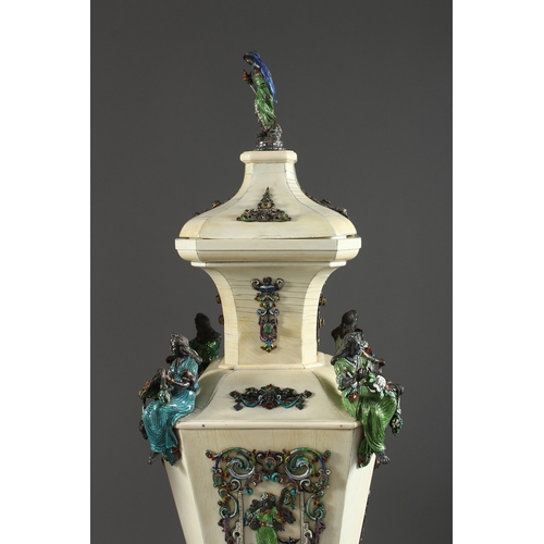 157 - A SUPERB PAIR OF VIENNA IVORY TAPERING VASES AND COVERS, mounted silver and enamel plaques set with ... 