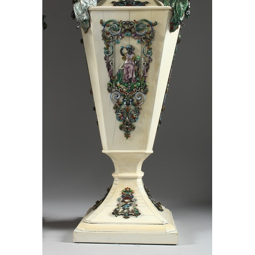 157 - A SUPERB PAIR OF VIENNA IVORY TAPERING VASES AND COVERS, mounted silver and enamel plaques set with ... 