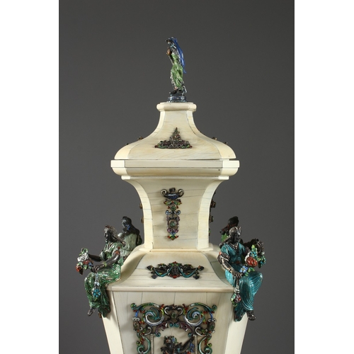 157 - A SUPERB PAIR OF VIENNA IVORY TAPERING VASES AND COVERS, mounted silver and enamel plaques set with ... 