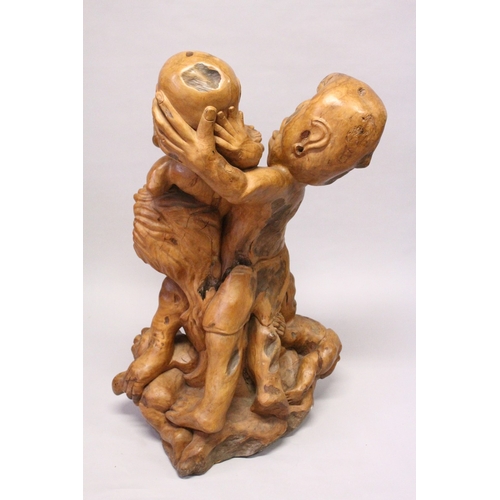 161 - A LARGE UNUSUAL CHINESE ROOTWOOD SCULPTURE OF A MOTHER, FATHER AND THREE CHILDREN, all with anxious ... 