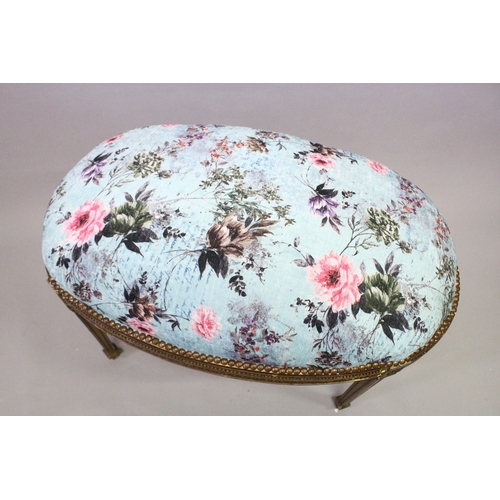 165 - A GILT WOOD LARGE STOOL, upholstered with a  floral print, on square legs. 3 ft 3 ins long x 2 ft  w... 