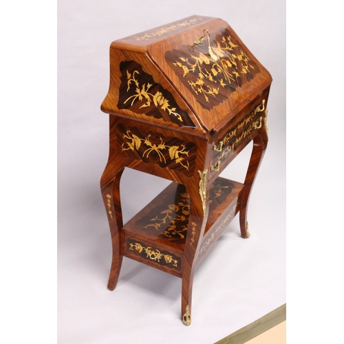 167 - A FRENCH STYLE ROSEWOOD AND MARQUETRY BUREAU with drawers to the interior, two long drawers on cabri... 