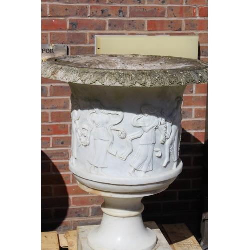 179 - A SUPERB NEAR PAIR OF ITALIAN CARVED WHITE MARBLE URNS ON STANDS, the sides covered with dancing lad... 