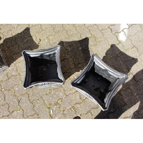 189 - A SMALL PAIR OF 19TH CENTURY FRENCH BLACK CAST IRON JARDINIERES. 1 ft 1 ins square