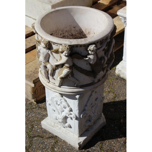 196 - A CIRCULAR GARDEN POT, the sides with classical figures 1 ft diameter