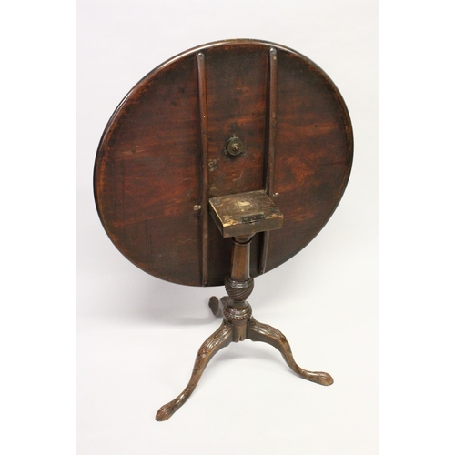 202 - A GEORGE III MAHOGANY CIRCULAR TILT TOP TRIPOD TABLE,  with dished top, turned vase shaped column on... 