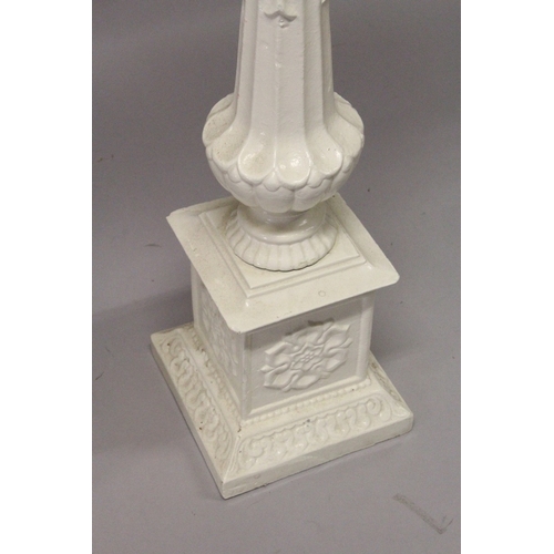 212 - A GOOD PAIR OF VICTORIAN WHITE PAINTED CAST IRON STANDS, fluted columns on pedestal bases. 3ft 4ins ... 