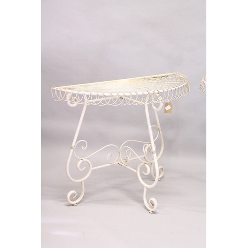 213 - A GOOD PAIR OF WHITE PAINTED WIREWORK DEMILUNE TABLES. 2ft 10ins high x 3ft 5ins wide.