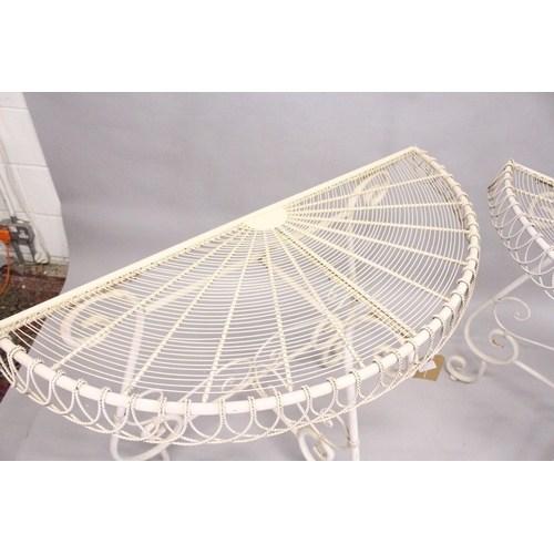 213 - A GOOD PAIR OF WHITE PAINTED WIREWORK DEMILUNE TABLES. 2ft 10ins high x 3ft 5ins wide.