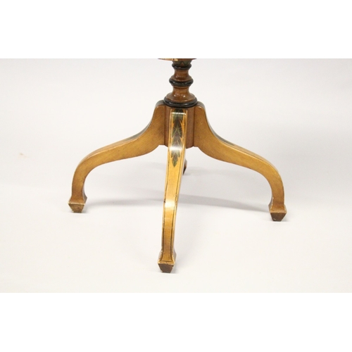 217 - A SHERATON REVIVAL PAINTED SATINWOOD OVAL TILT TOP TRIPOD TABLE. 2 ft 3 ins wide x 2 ft 4 ins high. ... 