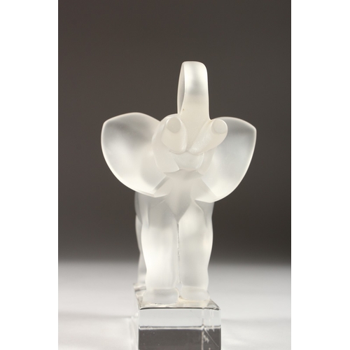 237 - A  LALIQUE CRYSTAL ELEPHANT  on a glass base Presentation E.V. 1963 - 88 Signed, 5.5 ins high... 