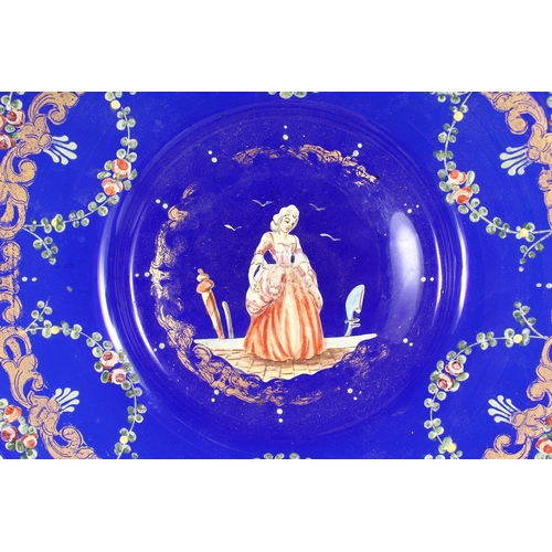 247 - A SET OF THREE VIENNA BLUE GLASS PLATES,  the centre with figures 7.5 ins diameter.