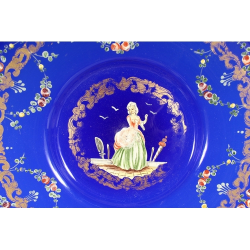 247 - A SET OF THREE VIENNA BLUE GLASS PLATES,  the centre with figures 7.5 ins diameter.