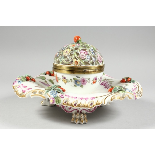 259 - A GOOD 19TH CENTURY CONTINENTAL PORCELAIN CIRCULAR INKSTAND with pierced floral top, painted with fl... 