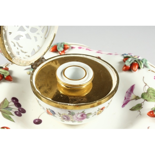 259 - A GOOD 19TH CENTURY CONTINENTAL PORCELAIN CIRCULAR INKSTAND with pierced floral top, painted with fl... 