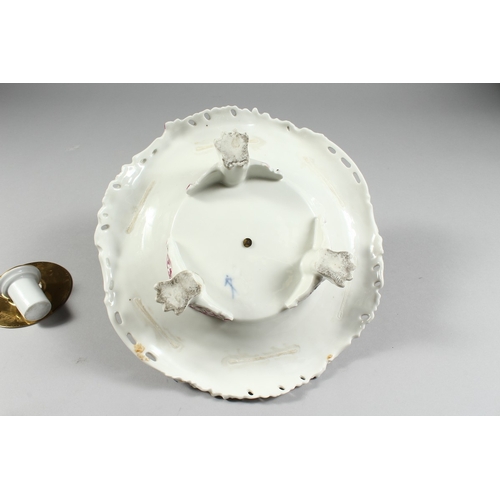 259 - A GOOD 19TH CENTURY CONTINENTAL PORCELAIN CIRCULAR INKSTAND with pierced floral top, painted with fl... 