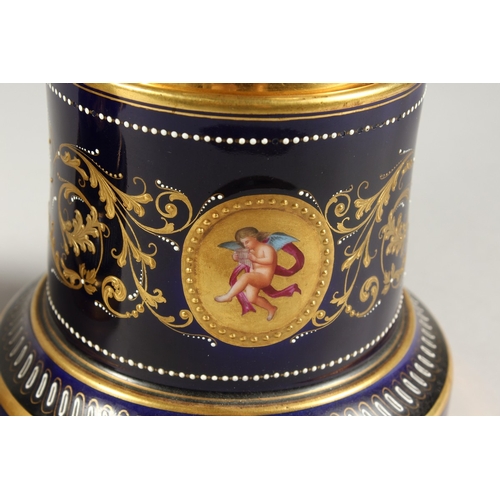 276 - A SUPERB PAIR OF VIENNA VASES, COVERS AND STANDS, the rich blue ground edged in gilt and painted wit... 