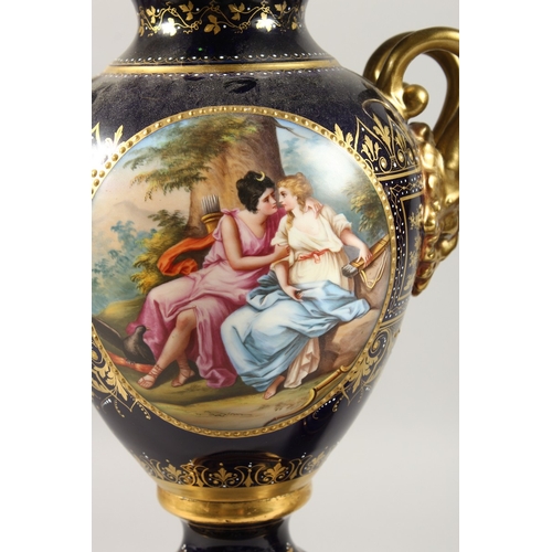 276 - A SUPERB PAIR OF VIENNA VASES, COVERS AND STANDS, the rich blue ground edged in gilt and painted wit... 