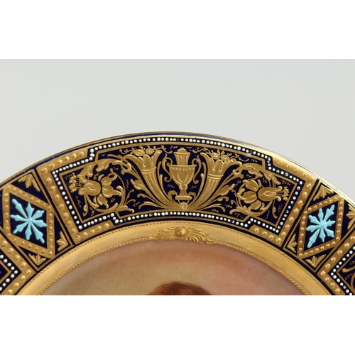 286 - A GOOD VIENNA CIRCULAR PLATE, blue and gilt border, the centre painted with a portrait  'Aspiration'... 