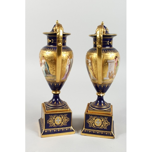 294 - A SUPERB PAIR OF VIENNA TWO HANDLED VASES AND COVERS, rich blue and gilt grounds, painted with a ban... 