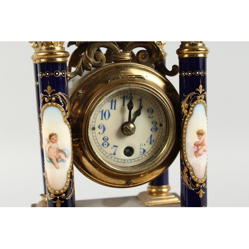 295 - A SUPERB  VIENNA PORCELAIN  AND GILT METAL PILLAR CLOCK  painted with cupids with blue and gilt grou... 