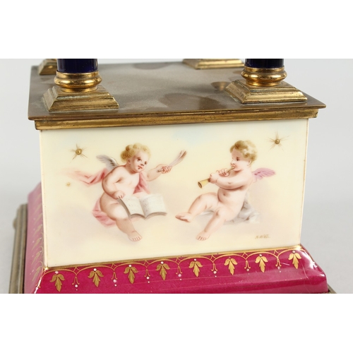 295 - A SUPERB  VIENNA PORCELAIN  AND GILT METAL PILLAR CLOCK  painted with cupids with blue and gilt grou... 